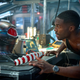 Black Manta (Yahya Abdul-Mateen II) marveling at his helmet.